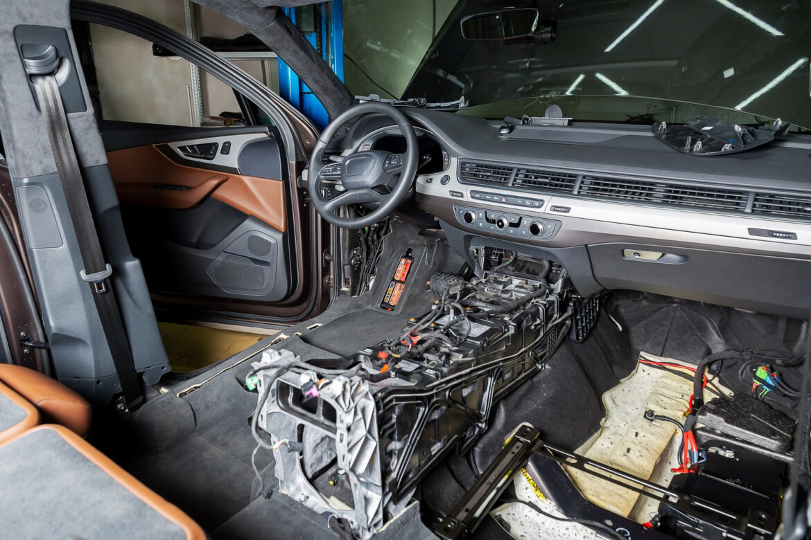 car-repair-service-centerdismantled-interiorcheck-wiring-removed-chairsfloor-trimgearbox-repair (1)