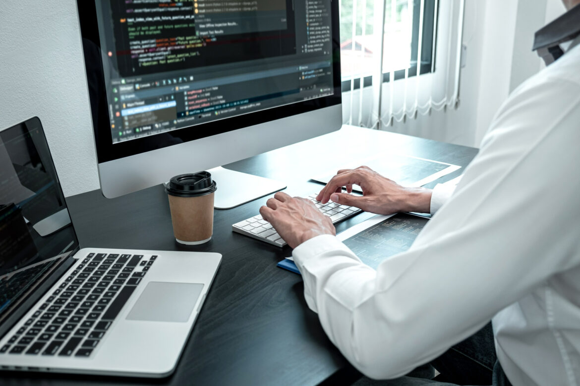 young-programmer-working-software-javascript-computer-it-office